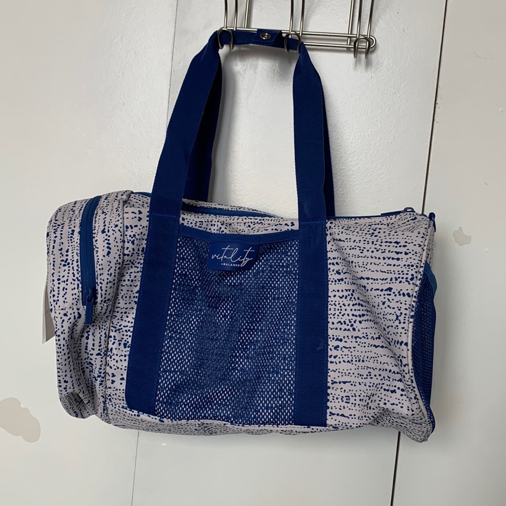 Blue and white vitality duffle / gym bag